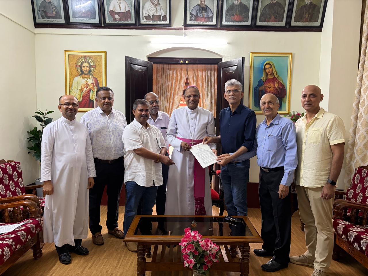 The Catholic Club delegation presenting a project document to Most Rev Dr Peter Paul Saldanha, Bishop of Mangalore.